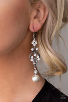 Elegantly Extravagant White Earring