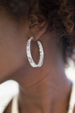 glitzy by association white blockbuster hoop earring